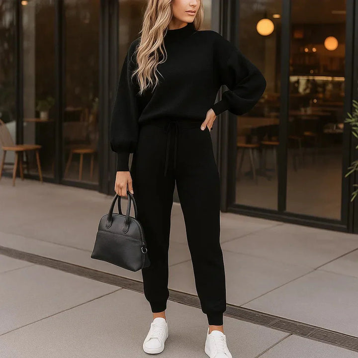 Tenue loungewear femme moderne, ensemble douillet pantalon et sweatshirt pour le confort hivernal.