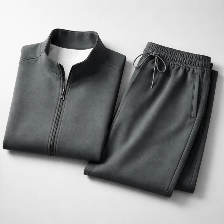 Survêtement complet homme élégant : veste à fermeture éclair et pantalon confortable pour le sport ou mode masculine.