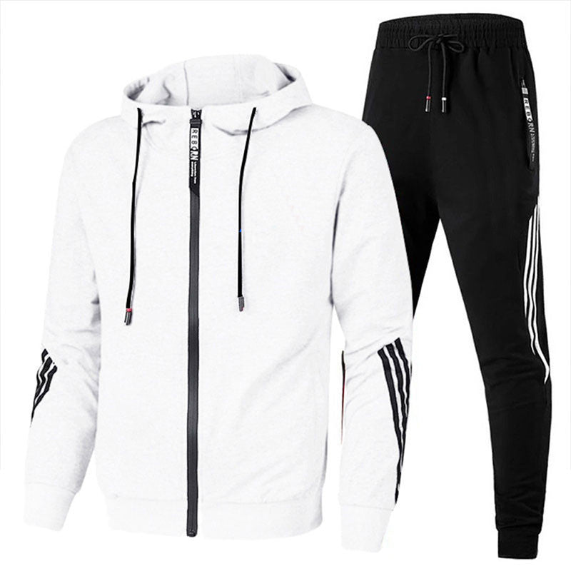 "Ensemble de survêtement homme gris, coupe ergonomique, matériau respirant idéal sport et loisirs, confort et style modernes.