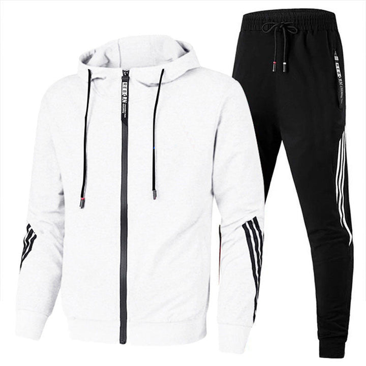 "Ensemble de survêtement homme gris, coupe ergonomique, matériau respirant idéal sport et loisirs, confort et style modernes.