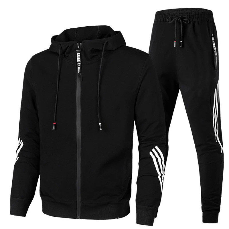 "Ensemble de survêtement homme gris, coupe ergonomique, matériau respirant idéal sport et loisirs, confort et style modernes.
