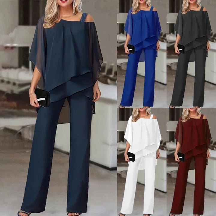 Ensemble élégant femme, haut manches chauve-souris, coupe épurée, coloris blanc, bleu, noir, rouge, style chic et confortable