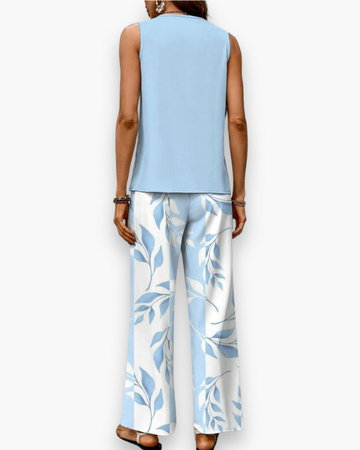 "Ensemble estival fluide pour femme, coupe élégante, haut sans manches, idéal pour look chic et confort par temps chaud."