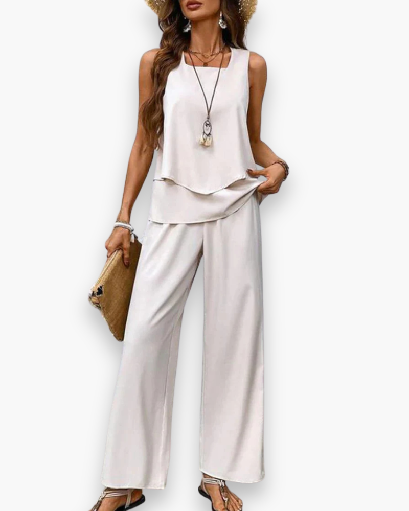 "Ensemble estival fluide pour femme, coupe élégante, haut sans manches, idéal pour look chic et confort par temps chaud."