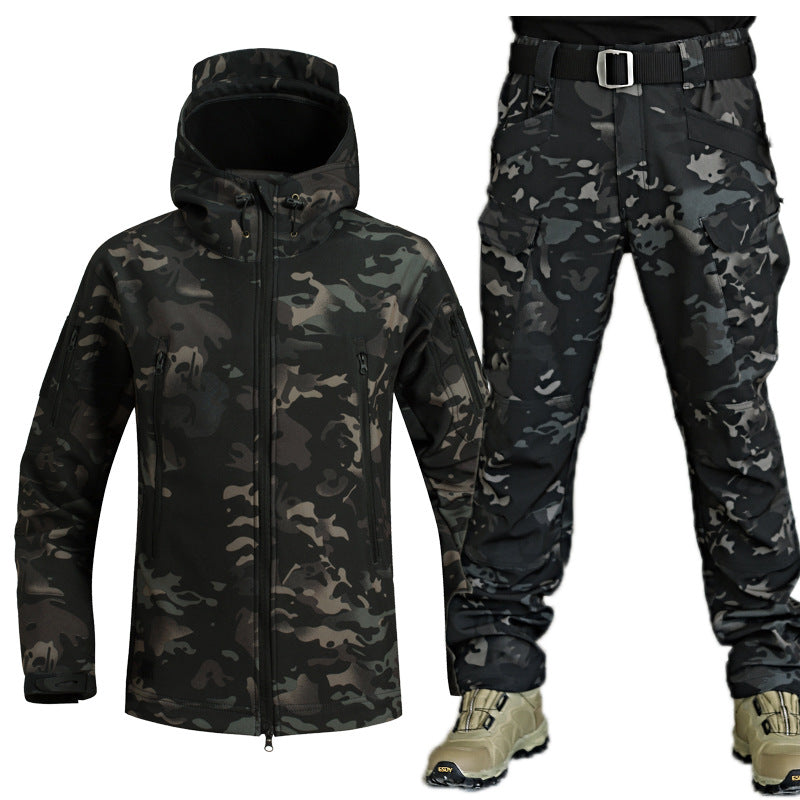 Vêtement de sport homme Marcus, pantalon veste coupe-vent pour des aventures en plein air.