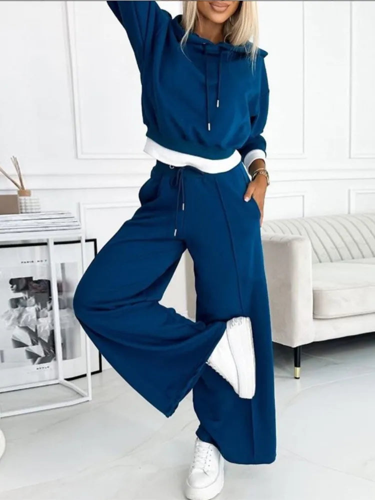 Tenue femme 2 pièces décontractée avec haut et pantalon amples. Confort et style assurés pour ce loungewear estival.
