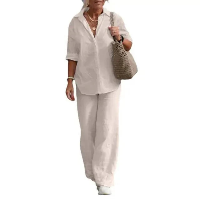 Ensemble chic femme pour l'été : chemisier à boutons manches courtes et pantalon large fluide. Confort et style.