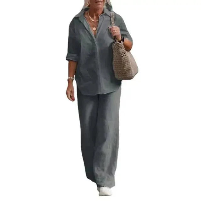 Ensemble femme deux pièces fluide : haut boutonné manches courtes et pantalon large. Idéal pour un look estival.