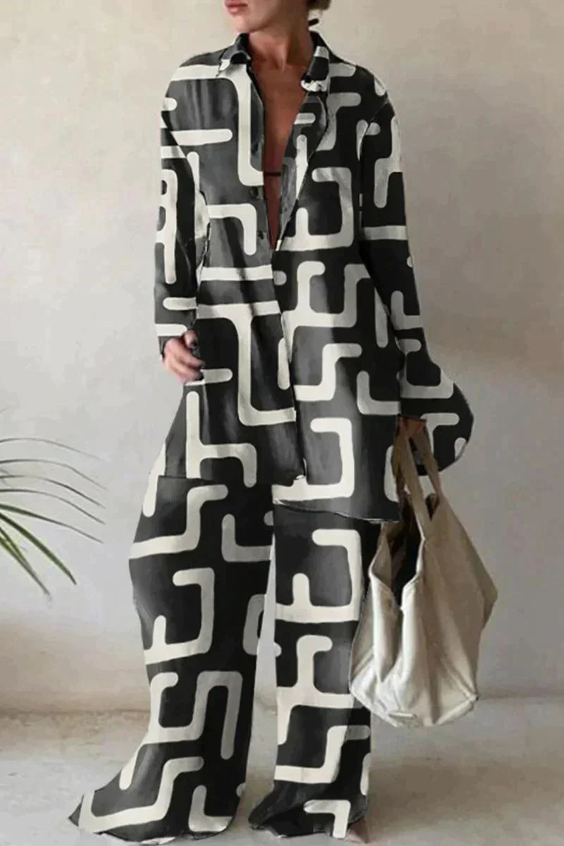 "Ensemble femme élégante avec chemise oversize à manches longues et pantalon large, motif abstrait moderne."