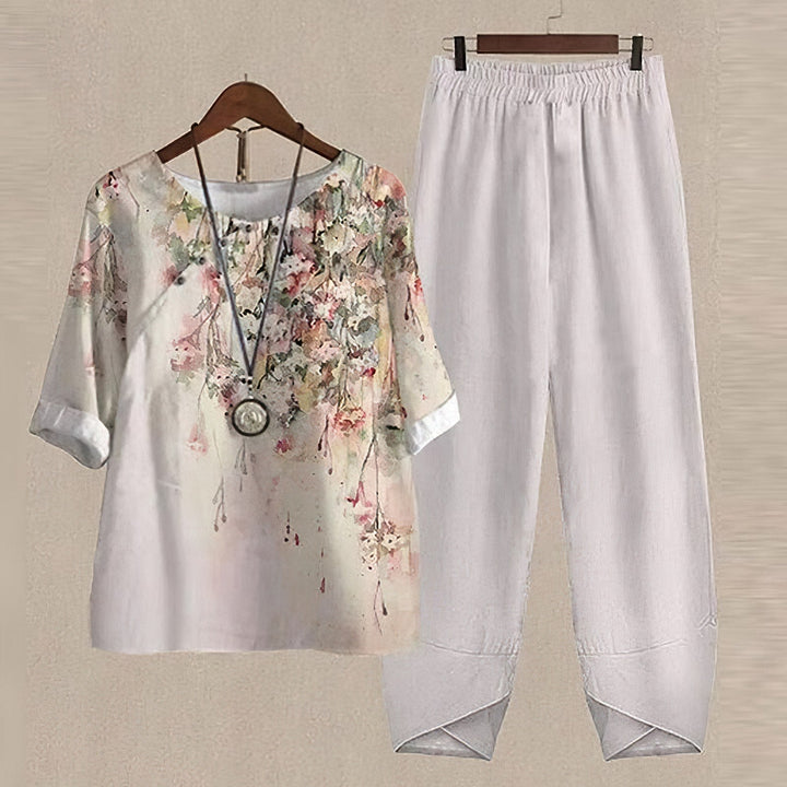 Ensemble deux pièces femme en polyester imprimé, manches 5/4. Parfait pour le printemps, look décontracté élégant.