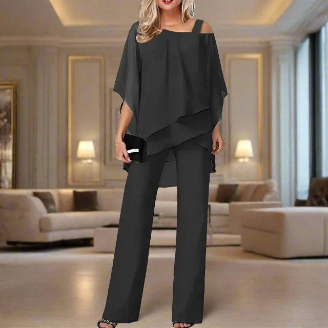 Tenue de soirée femme chic: ensemble fluide jumpsuit & blouse asymétrique. Idéal mariage ou événement spécial.