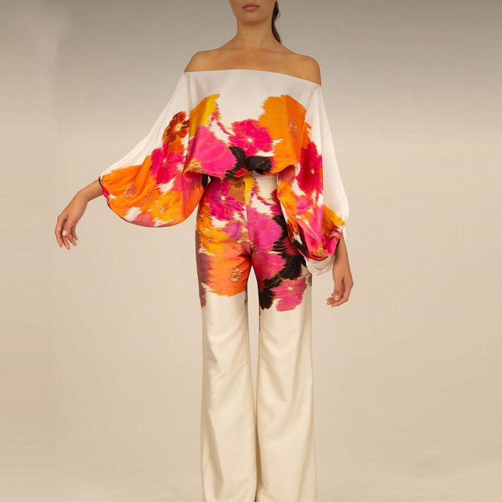 Ensemble élégant femme, pantalon large et haut assorti, parfait pour un look moderne et raffiné en toutes saisons.