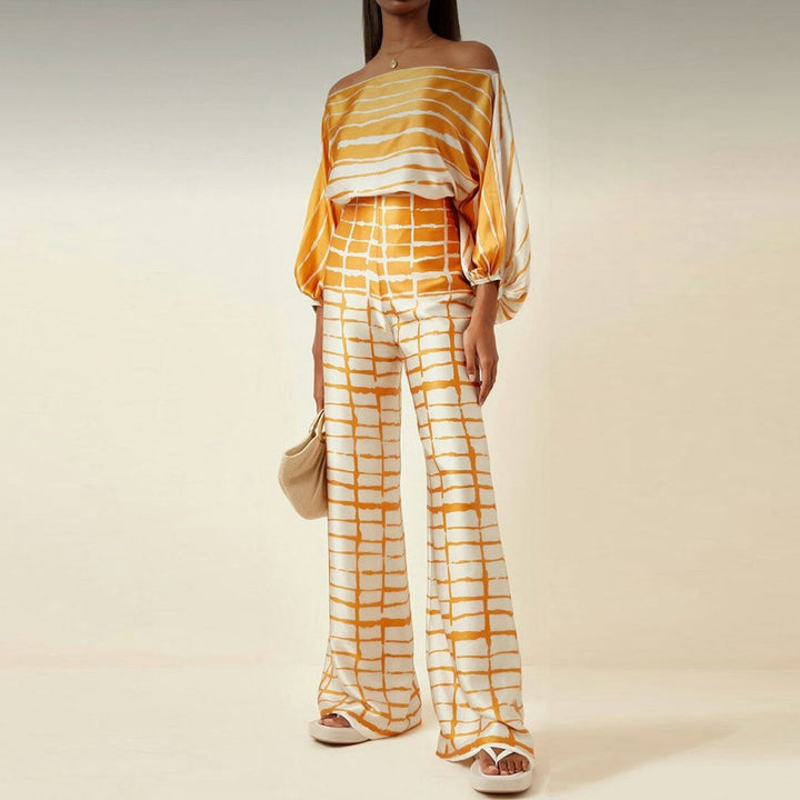 Ensemble femme chic motif 3D, pantalon large et blouse confortable, tenue moderne élégante et décontractée.