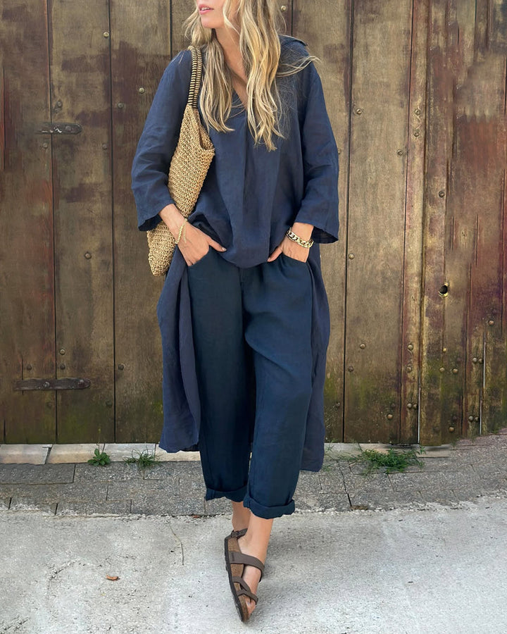 Tenue femme deux pièces décontractée pour l'été. Tunique ample et pantalon léger en lin. Confort estival garanti.