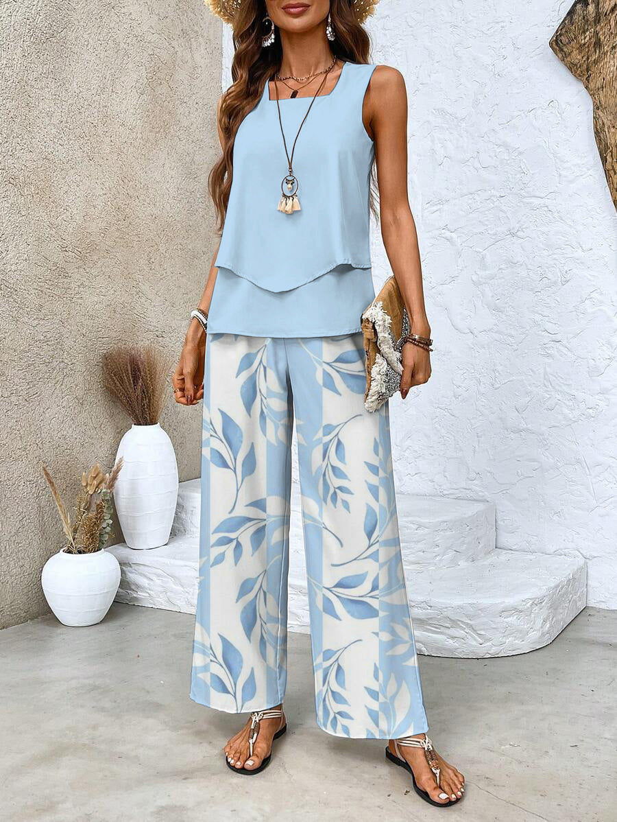 Ensemble floral élégant femme, haut et pantalon, pour un style chic et confortable au printemps-été.