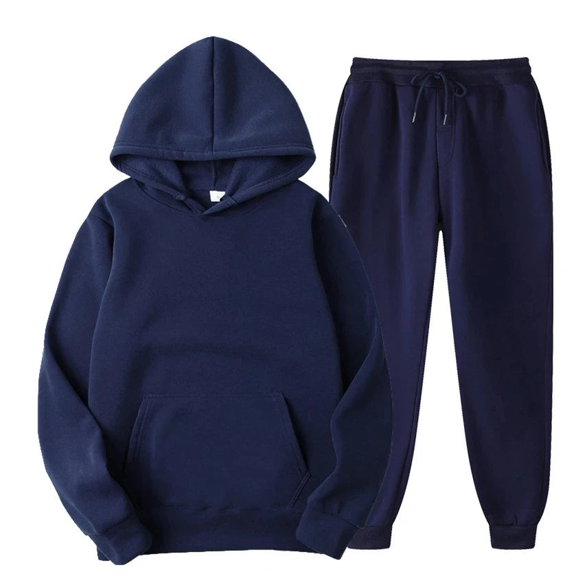 Ensemble jogging homme élégant, sweat à capuche et pantalon assorti. Confort mode masculine.
