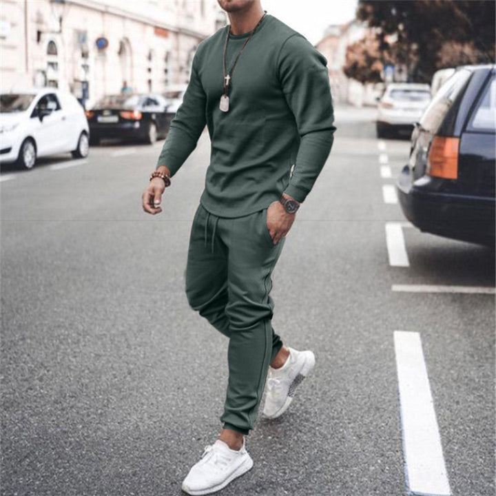 Ensemble jogging homme vert, style moderne et confortable.