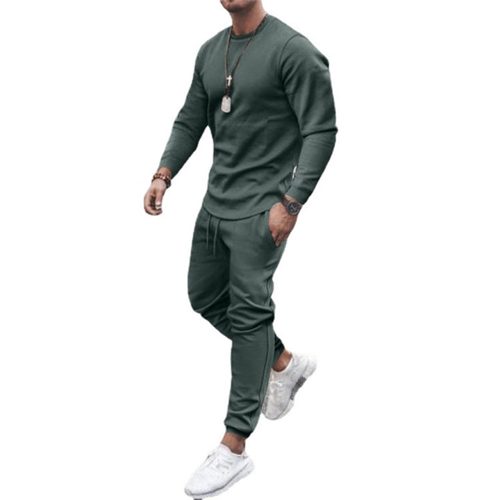 Ensemble jogging homme vert, style moderne et confortable.