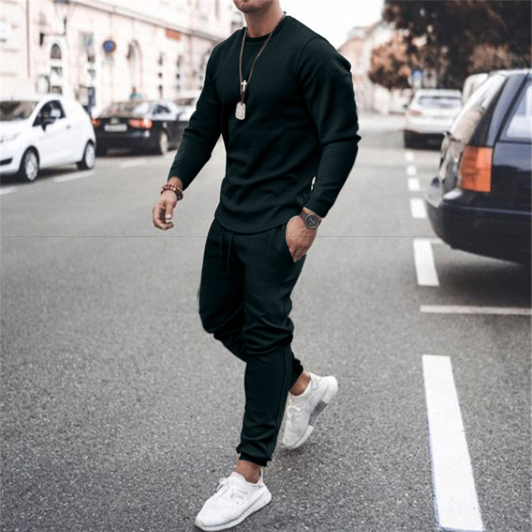Ensemble jogging homme vert, style moderne et confortable.