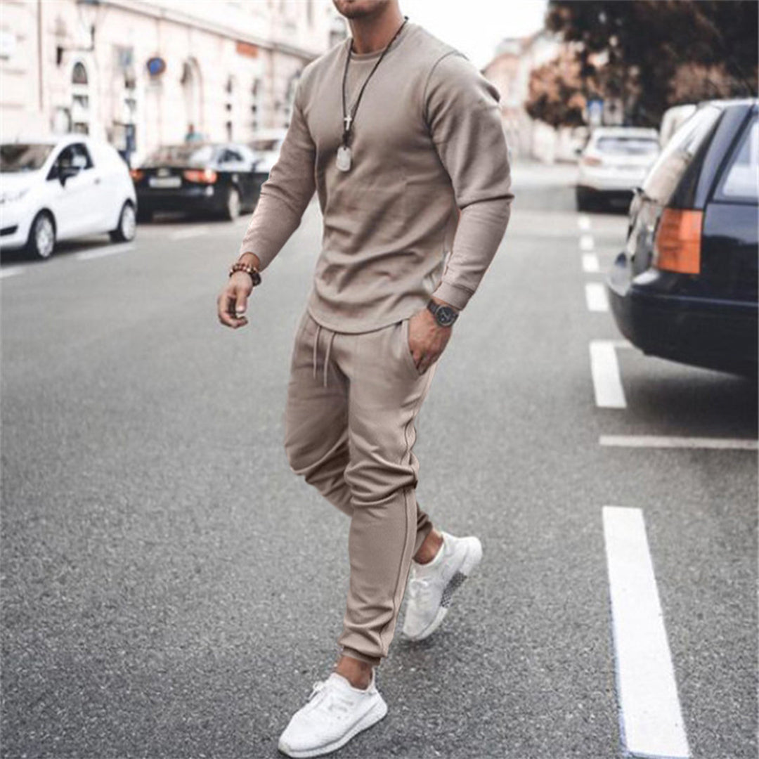 Ensemble jogging homme vert, style moderne et confortable.