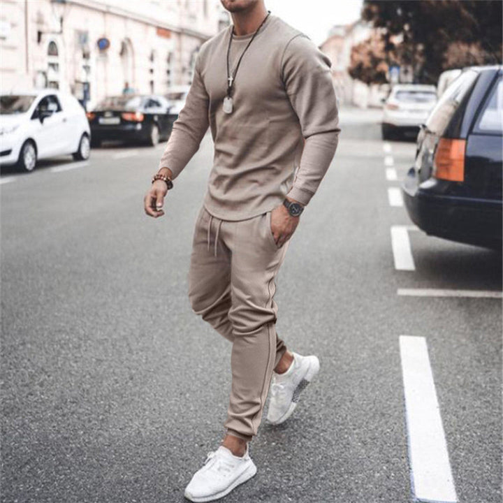 Ensemble jogging homme vert, style moderne et confortable.