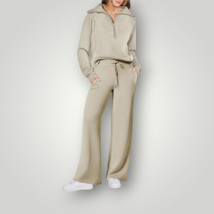 Tenue décontractée femme : ensemble sweat à capuche et pantalon doux, idéal pour le confort et le style quotidien.