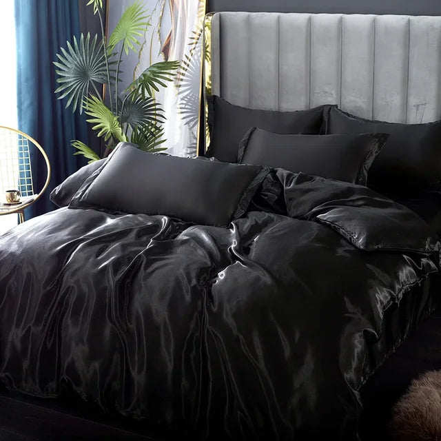 Ensemble satin luxe: housse de couette, draps et taies d'oreiller.  Douceur soyeuse, élégance et confort ultime.