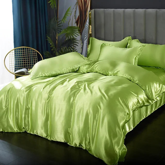 Ensemble satin luxe: housse de couette, draps et taies d'oreiller.  Douceur soyeuse, élégance et confort ultime.