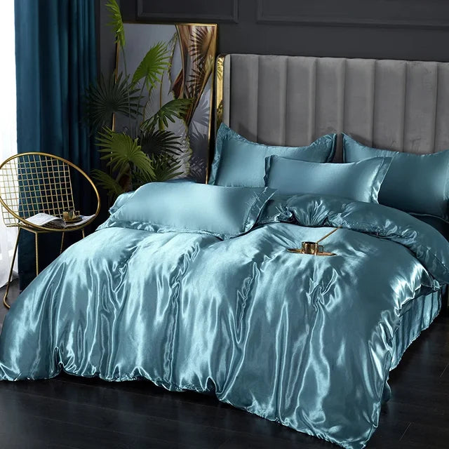 Ensemble satin luxe: housse de couette, draps et taies d'oreiller.  Douceur soyeuse, élégance et confort ultime.