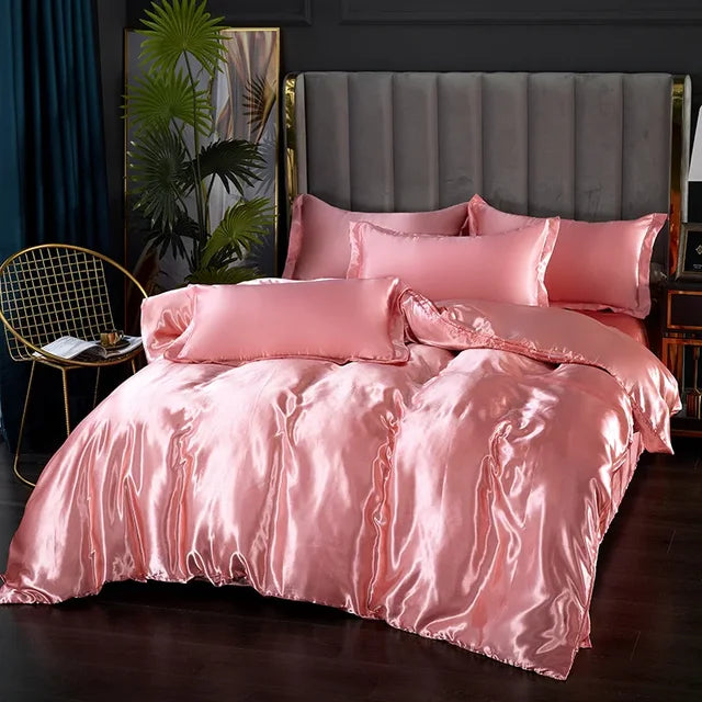 Ensemble satin luxe: housse de couette, draps et taies d'oreiller.  Douceur soyeuse, élégance et confort ultime.