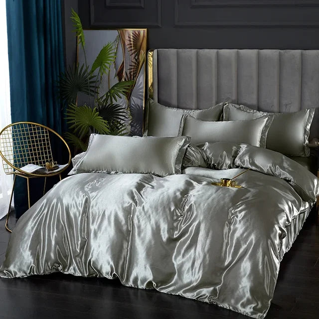 Ensemble satin luxe: housse de couette, draps et taies d'oreiller.  Douceur soyeuse, élégance et confort ultime.