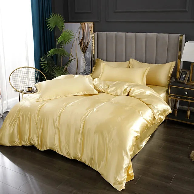 Ensemble satin luxe: housse de couette, draps et taies d'oreiller.  Douceur soyeuse, élégance et confort ultime.
