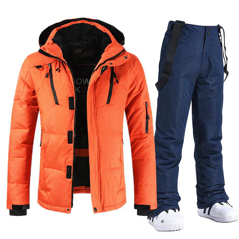 "Ensemble ski homme imperméable, veste bleu e pantalon noir coupe-vent, parfait pour activités extérieures hivernales"