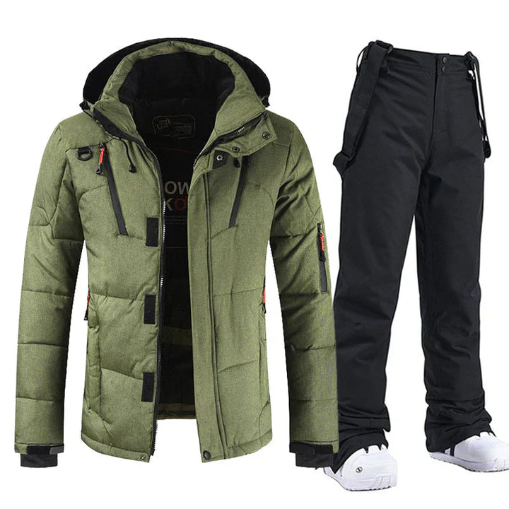 "Ensemble ski homme imperméable, veste bleu e pantalon noir coupe-vent, parfait pour activités extérieures hivernales"