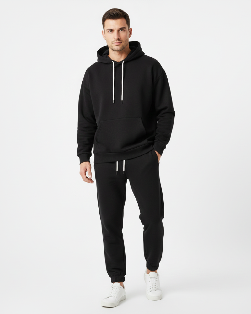 Survetement homme casual avec hoodie à capuche et pantalon de jogging, idéal pour le sport ou détente.