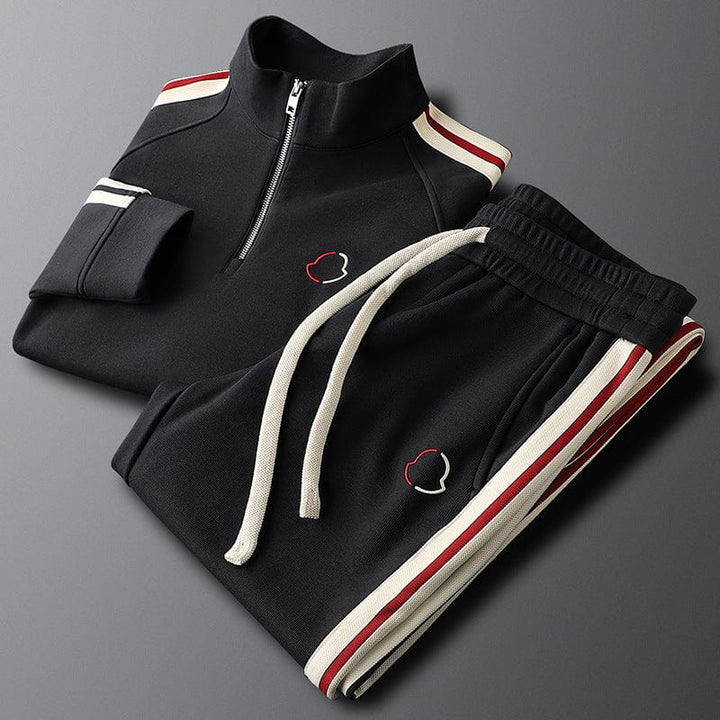 Ensemble survêtement moderne, coupe décontractée.  Confort et style pour le sport et les loisirs.