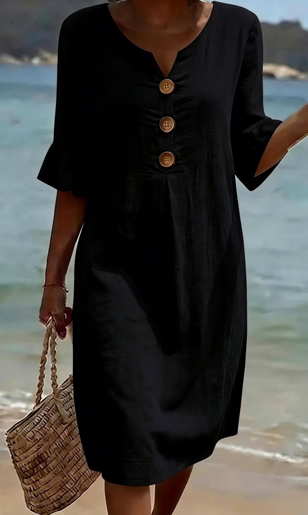 Magnifique robe estivale femme, en coton lin, boutonnée, avec volants aux manches. Chic et décontractée.