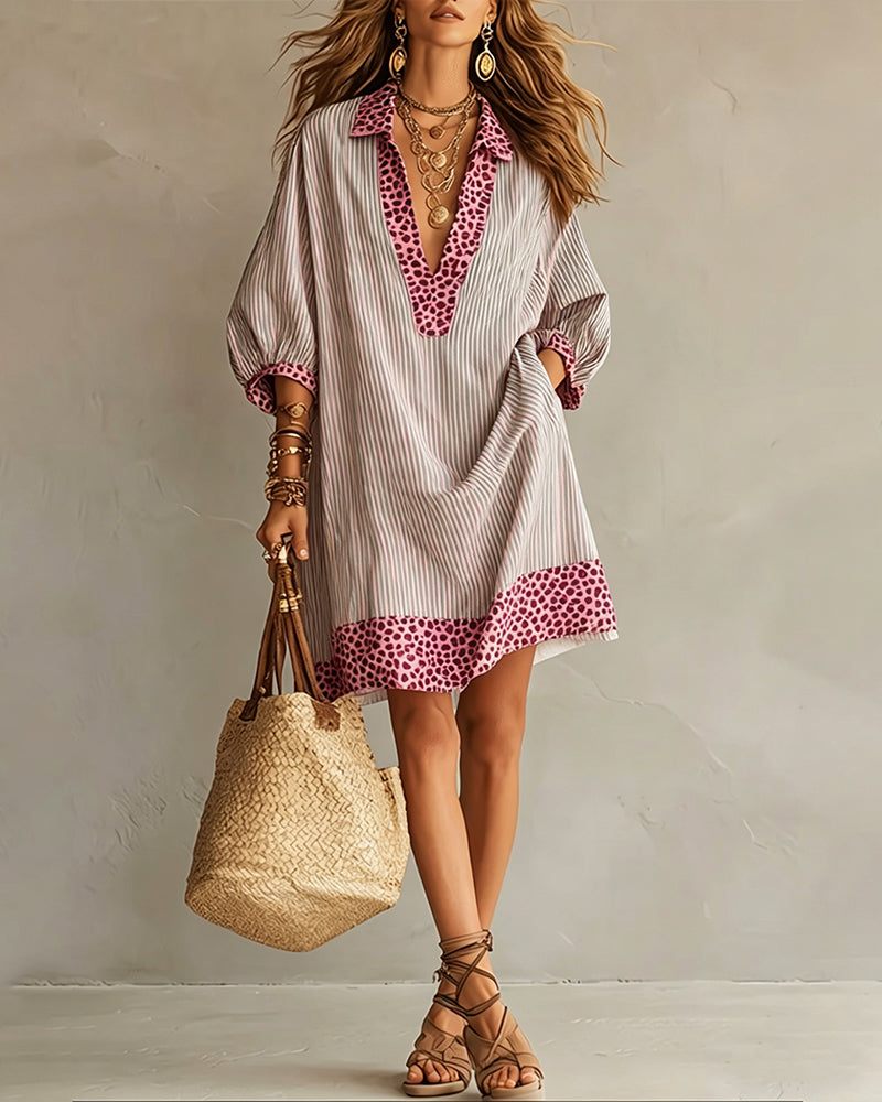 Chemisier-robe femme, imprimé léopard-rayures, manches bouffantes, idéal pour un look décontracté chic.