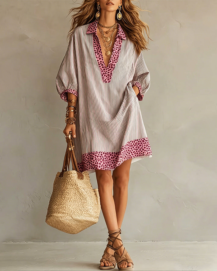 Chemisier-robe femme, imprimé léopard-rayures, manches bouffantes, idéal pour un look décontracté chic.