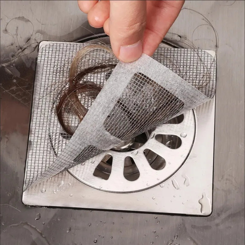 "Filtre de drain jetable transparent pour douche, prévient les blocages, maille biodégradable, facile à installer."