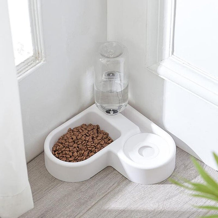 Fontaine à eau chat 500ml, sans électricité. Design moderne et compact, système 2-en-1 pour eau et nourriture.
