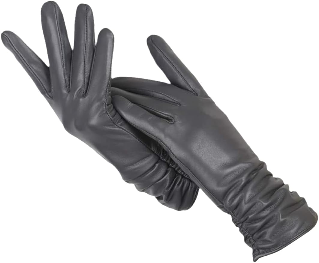 Gants noirs classiques pour femmes, accessoire indispensable pour rester chaude et élégante en mode hiver.