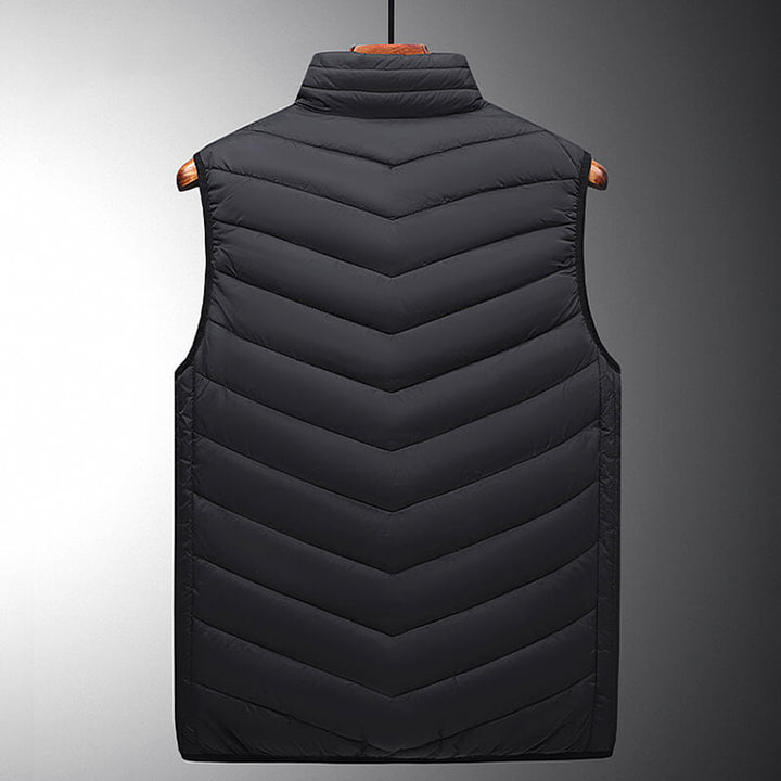 Gilet chauffant électrique pour homme, technologie avancée pour activités outdoor hivernales.