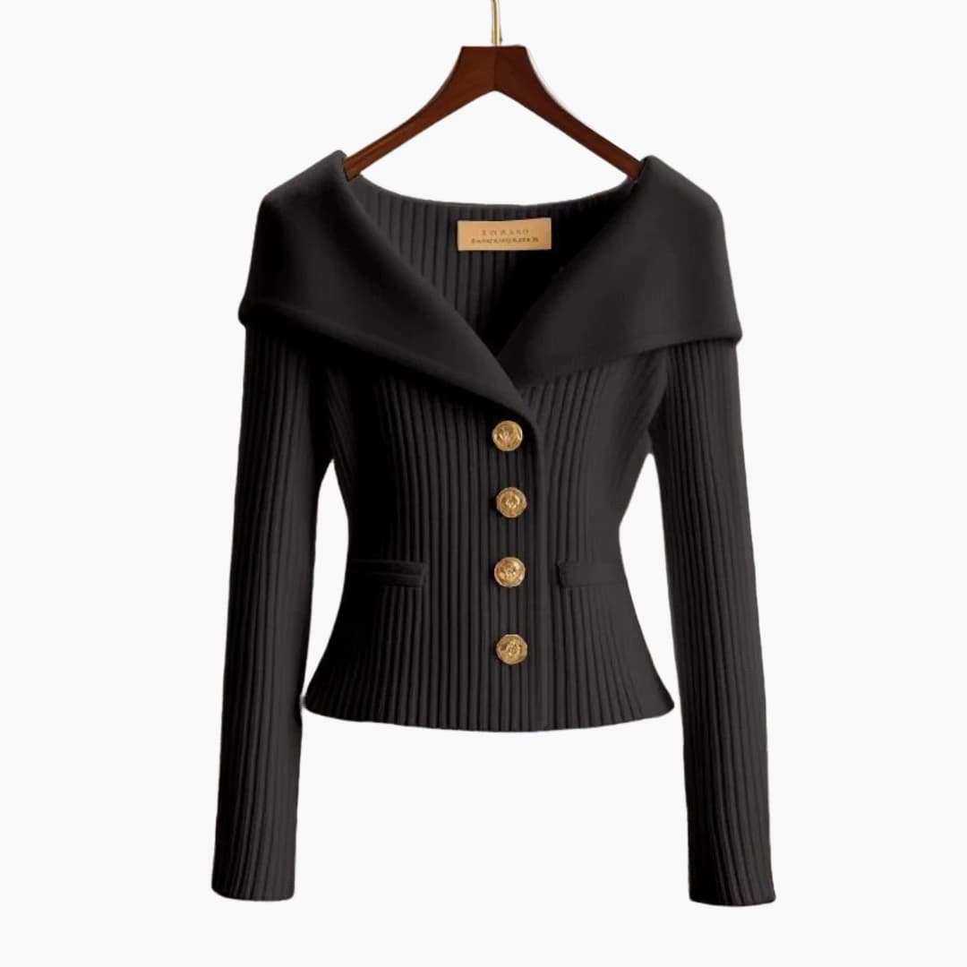 Gilet femme court et cintré, avec détails côtelés et boutons, idéal pour une superposition chic et décontractée.