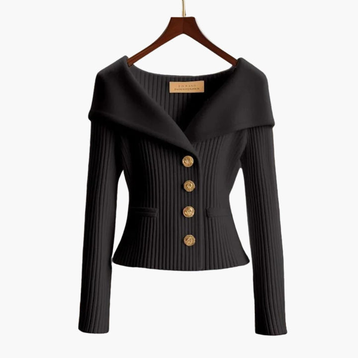 Gilet femme court et cintré, avec détails côtelés et boutons, idéal pour une superposition chic et décontractée.