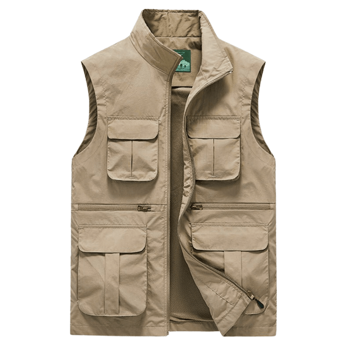 Gilet de voyage bleu marine, léger, séchage rapide, multi-poches, idéal randonnée et aventures extérieures.