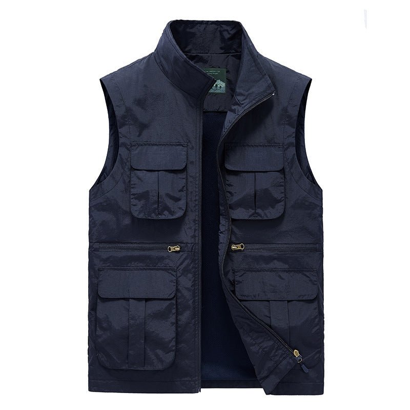 Gilet de voyage bleu marine, léger, séchage rapide, multi-poches, idéal randonnée et aventures extérieures.
