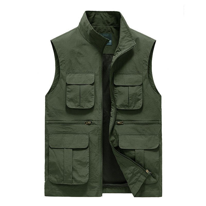 Gilet de voyage bleu marine, léger, séchage rapide, multi-poches, idéal randonnée et aventures extérieures.