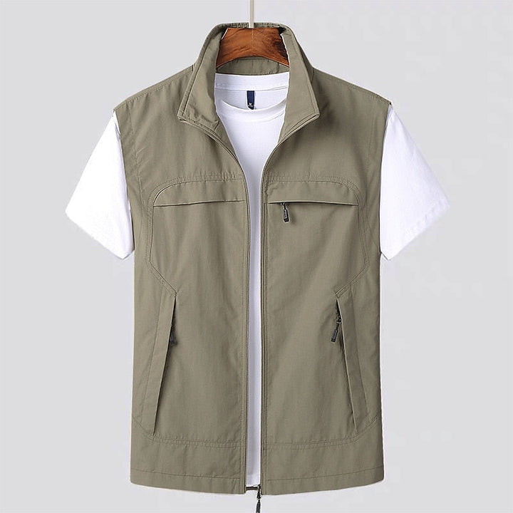 Gilet élégant homme, sans manches, couleur unie, look moderne et chic, style toutes saisons, disponible en plusieurs tailles.