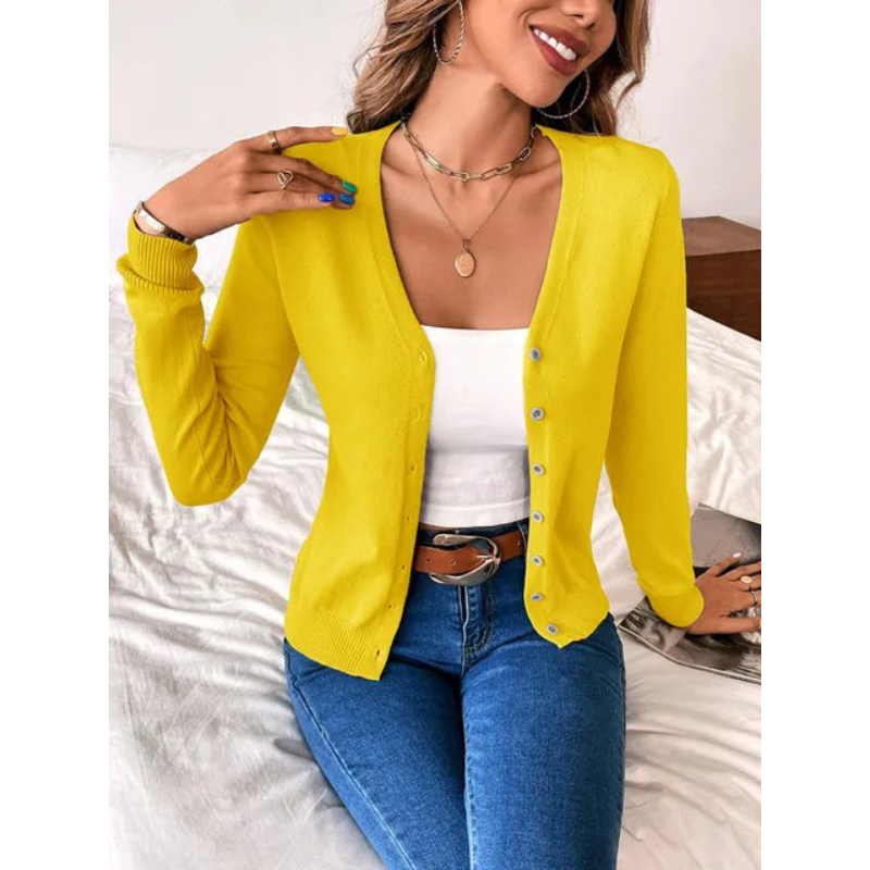 Mode femme : Gilet élégant col V, coupe ajustée et détails boutonnés pour un style moderne.